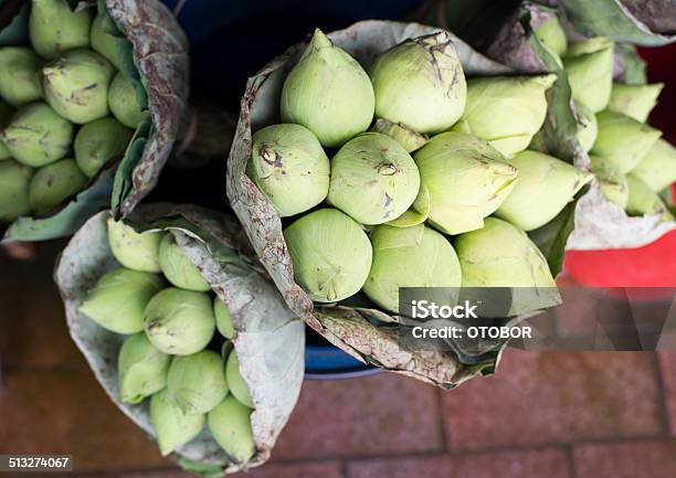 Green Lotus Bunch Wrap By Lotus Leaves In Market Stock Photo - Download Image Now - Aquatic Mammal, Aquatic Organism, Art