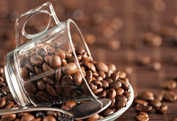 istock cup of glass with coffee beans 513275105