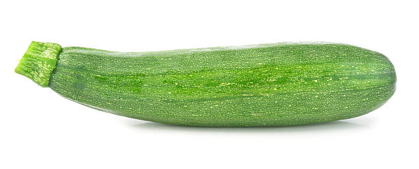 istock one fresh green zucchini isolated on white background 513275701