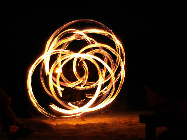 istock Fire Juggler In Full Swing 513292445