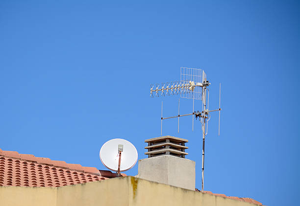 istock antennas and chimney 513292455