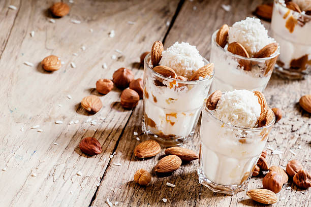 istock Dessert with vanilla ice cream, nut sauce, almond 513293634