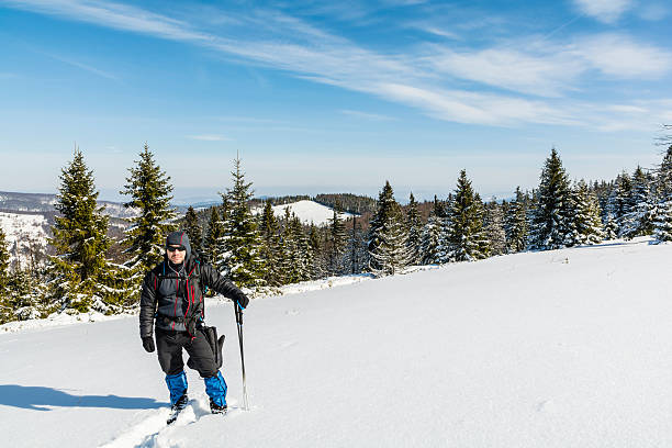 istock Hiker on the trail in winter. 513293714