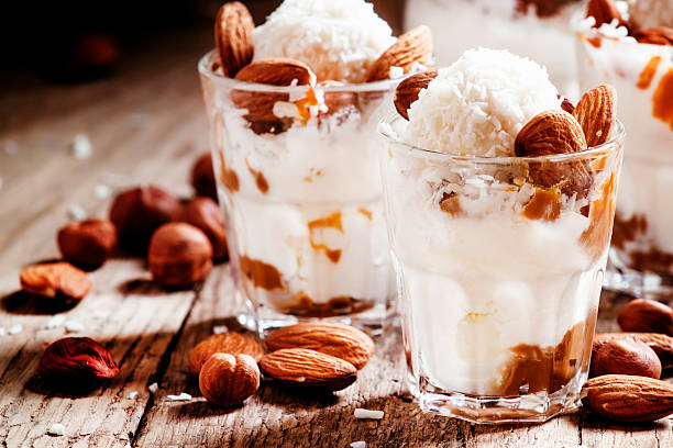 istock Dessert with vanilla ice cream, nut sauce, almond 513293938