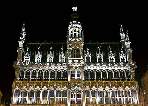 Brussels, Belgium - June 5, 2013: The Grand Place (Grote Markt) is the central square of Brussels. The famous Grand Place with its illuminated old buildings on the evening. The Museum of the City of Brussels located in the Maison du Roi (King's House), or Broodhuis (Breadhouse).