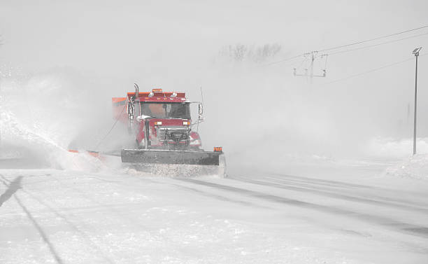 istock Snow plower truck in blizzard. 513295638
