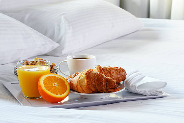istock Breakfast in bed in hotel room. 513296936