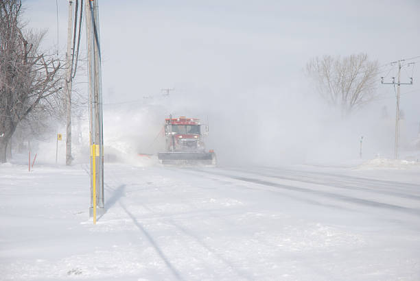 istock Snow plow truck on road. 513297730