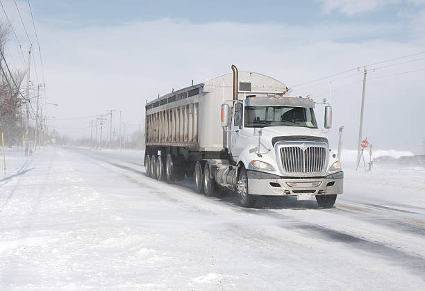 istock Semi truck in blizzard. 513297964