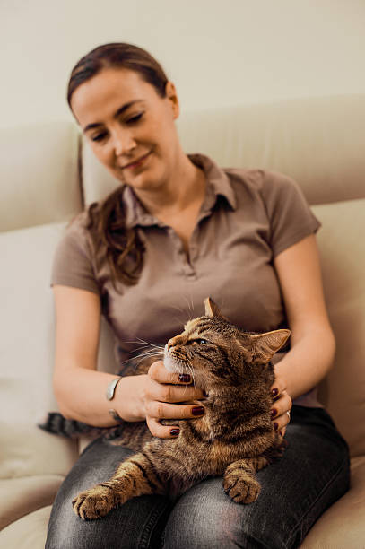 istock Woman Holding a Cat 513299754
