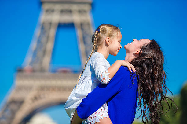 istock Happy family having fun in Paris background Eiffel Tower 513300876