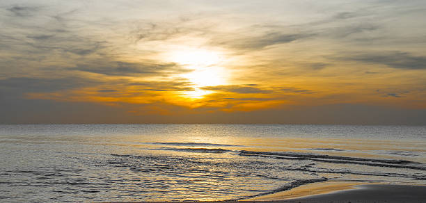 istock Sky water and shore in the evening. 513301618