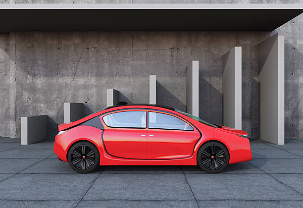istock Red electric car in front of geometric object background. 513301978