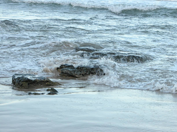 istock Waves falling over rough rocks in Queensland, Australia 513302766