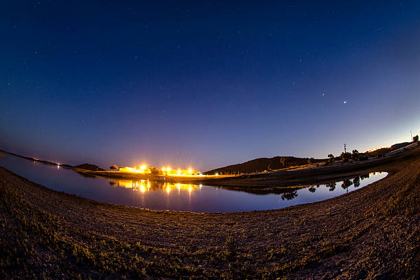 istock Planets and Reflections in the Quite Alqueva Lake 513302868