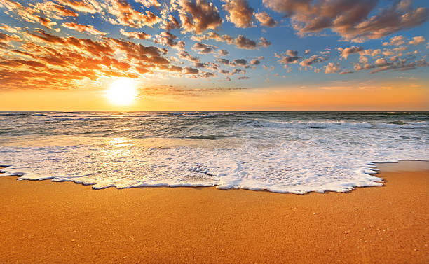 istock Colorful ocean beach sunrise. 513313026