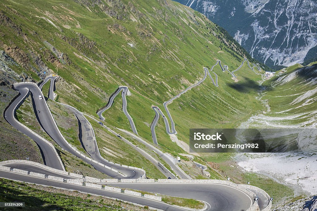 serpentine mountain road in Italian Alps, Stelvio pass, Passo de serpentine mountain road in Italian Alps, Stelvio pass, Passo dello Stelvio, Stelvio Natural Park Bicycle Stock Photo