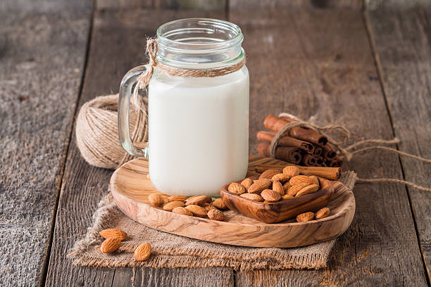istock almonds milk in a glass jar with almonds 513314798