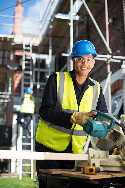 istock young male carpenter on site 513315735