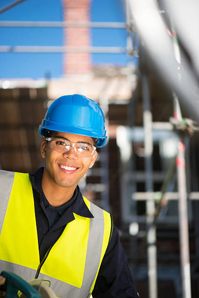 istock young male carpenter on site 513315747