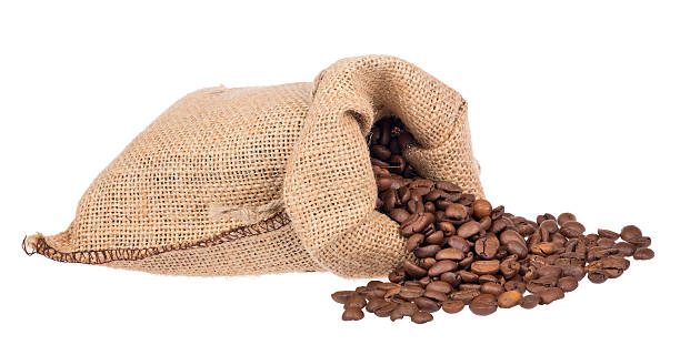marrom grãos de café em tecido de saco em branco - coffee crop brown bean beige - fotografias e filmes do acervo