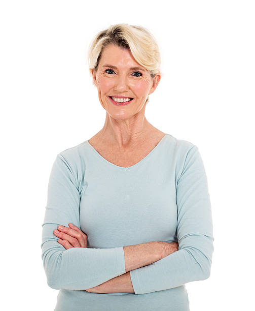 istock middle aged woman with arms crossed 513317096
