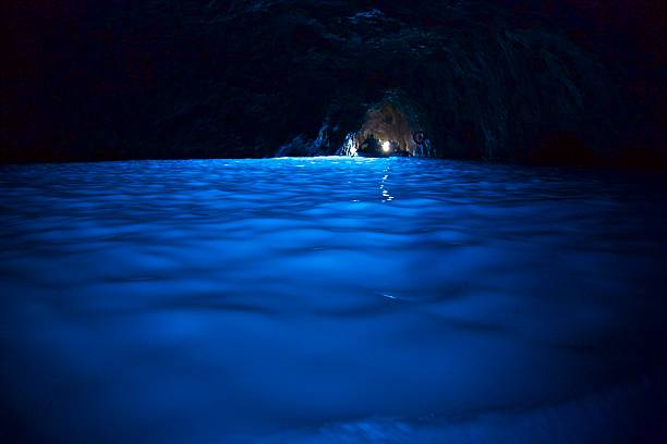 istock rowing boats inside the blue grotto capri 513317931