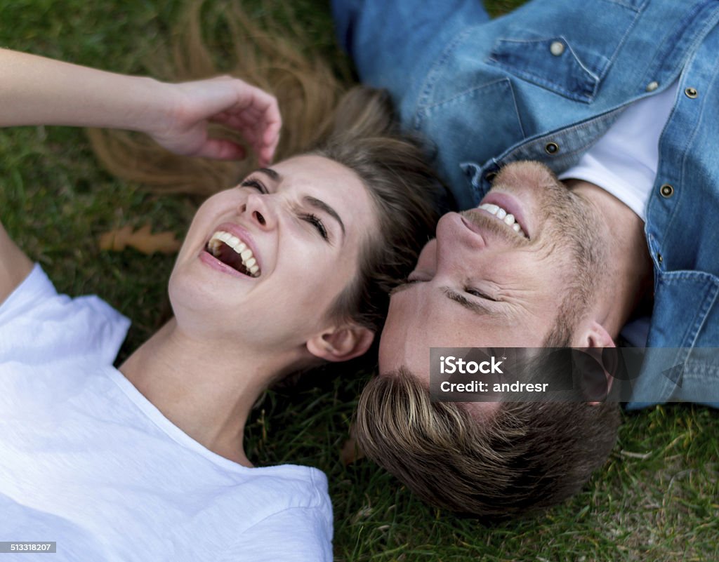 Couple having fun Happy couple having fun outdoors and laughing 20-29 Years Stock Photo