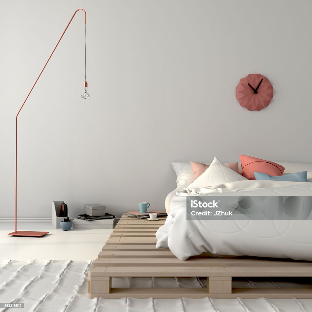 Stylish bed on wooden pallets and pink décor Stylish white bedroom with a bed on wooden pallets and pink décor Pallet - Industrial Equipment Stock Photo