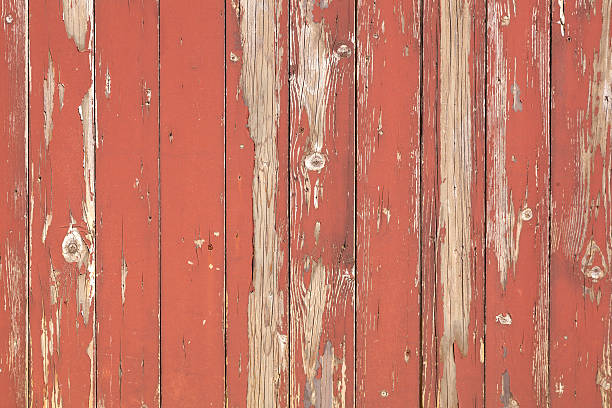 istock closeup of old brown red planks with peeling paint 513319270
