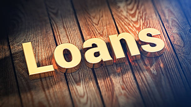 Word Loans on wood planks The word "Loans" is lined with gold letters on wooden planks. 3D illustration image types of loans stock pictures, royalty-free photos & images