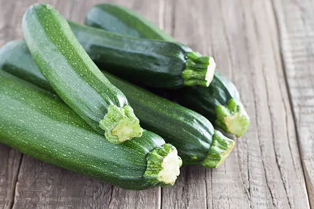 Zucchini on a wooden table