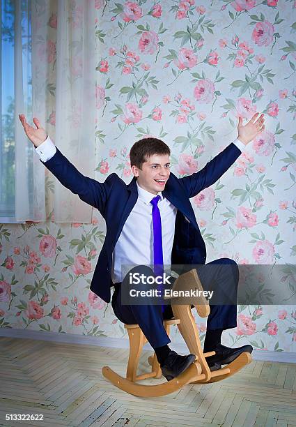 Childish Businessman With Toy Horse Stock Photo - Download Image Now - Horse, Men, Riding