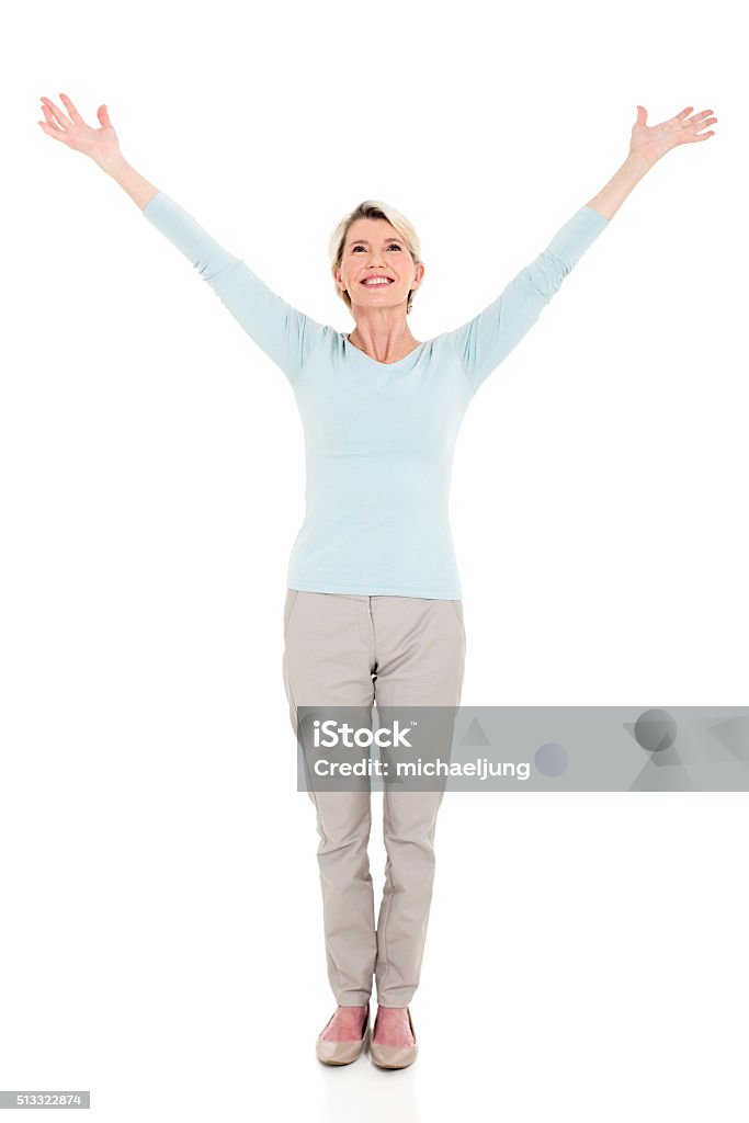 senior woman arms open cheerful senior woman arms open isolated on white background Women Stock Photo