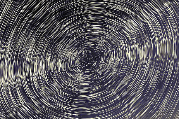 istock abstract long exposure of star trails background 513323944