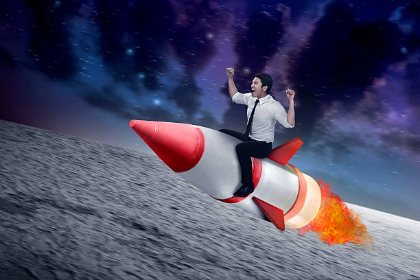 istock asian business man flying ride rocket 513325486