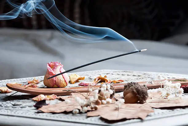 Incense stick on wooden table