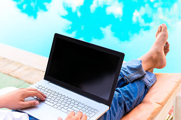 istock man's hands working with laptop close up 513359833