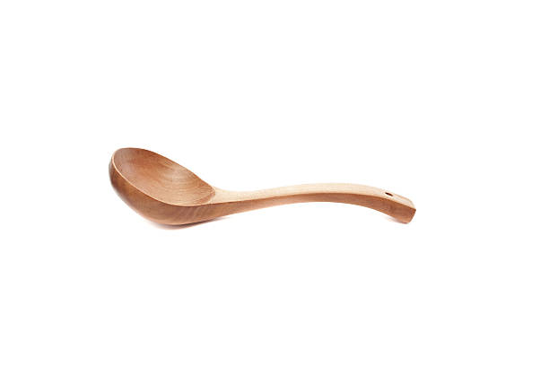 istock Wooden spoon isolated on white background 513359943