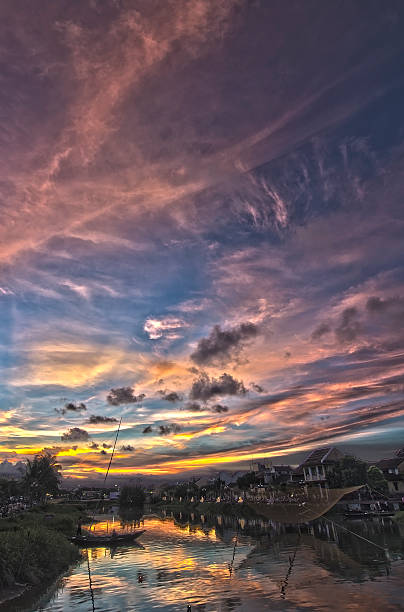 istock Dramatic sunset colors at the river bank 513360105