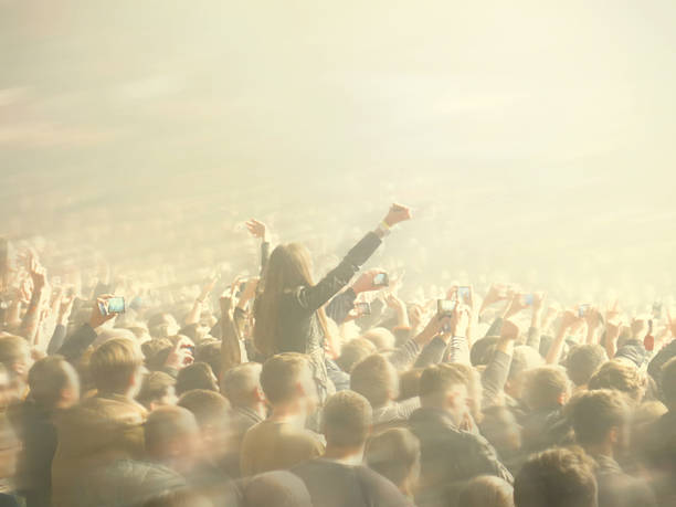 istock Abstract blurred image. Crowd People musical during public concert performance 513362838