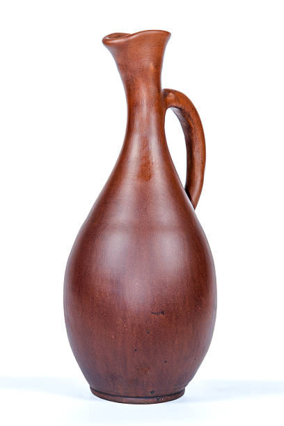 istock Antique vintage Slavic earthenware jug, timetable national ornament. White background. 513363172