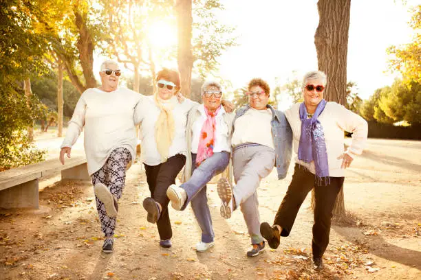 Photo of Happy senior adult women wearing sunglasses