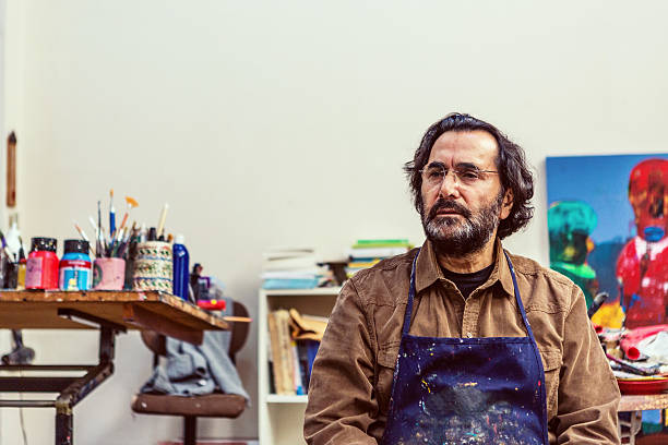 istock Painter Sitting Front of Easel in Art Sudio 513364450