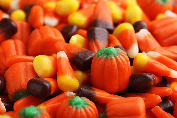 istock Halloween candy corns background, close up 513366572