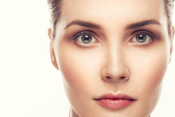 istock Beautiful woman face close up portrait studio on white 513367818