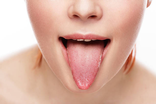 istock natural tongue open mouth 513367836