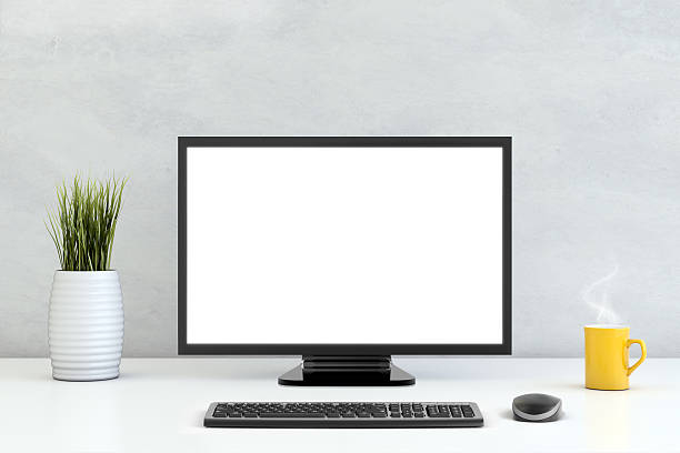 Large PC monitor in front of a concrete wall White brick wall, with PC working setup in front of it, white pc computer monitor stock pictures, royalty-free photos & images