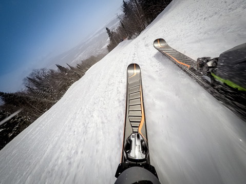 POV of a skier going down on fresh snow