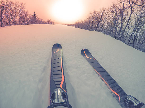 istock POV of a skier going down on fresh snow 513369462